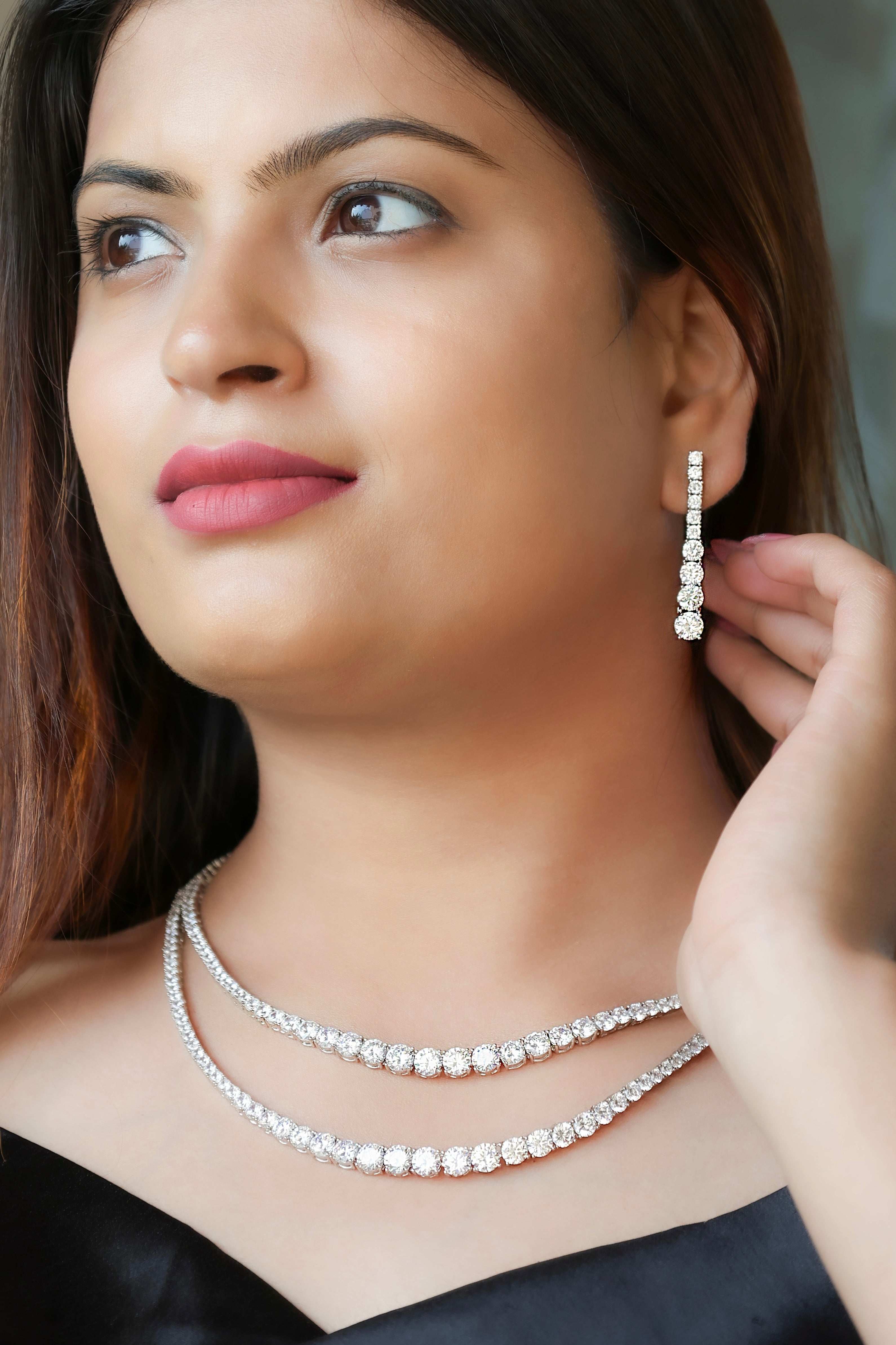 Two layered Diamond Necklaces set with matching earrings